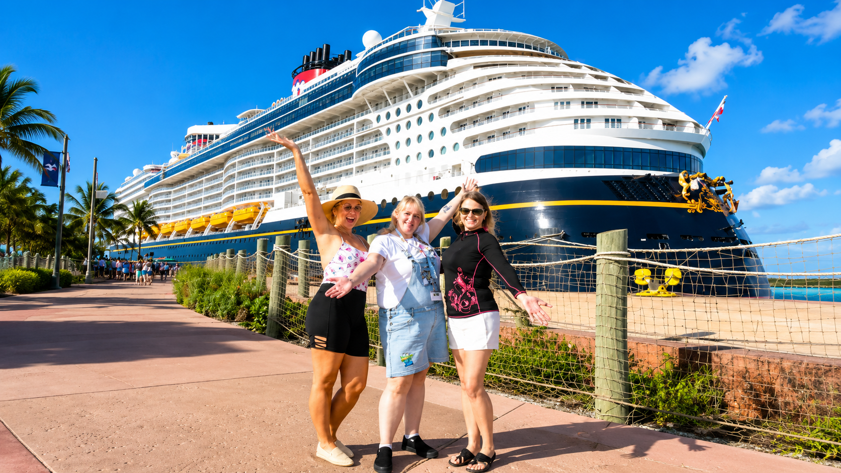 Friends celebrating by a large cruise ship
